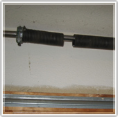 Garage door broken spring repair, replacement services